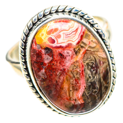 Sterling silver ring with oval crazy lace agate cabochon and carved rope border