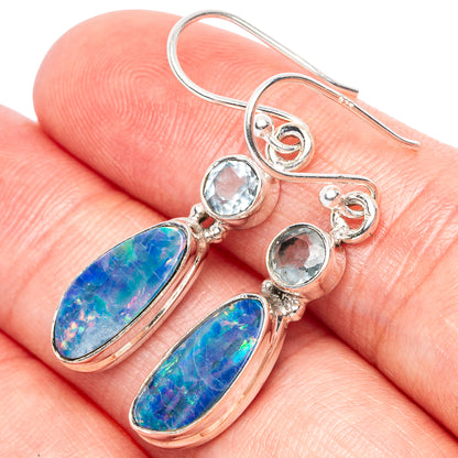 Sterling silver earrings with blue opal teardrops and round light-blue gemstones