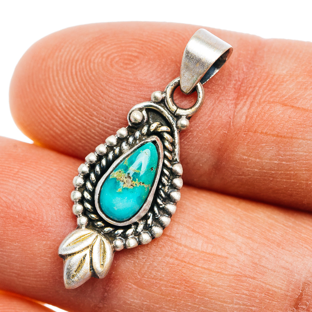 Sterling silver turquoise teardrop pendant with beaded frame and leaf accents