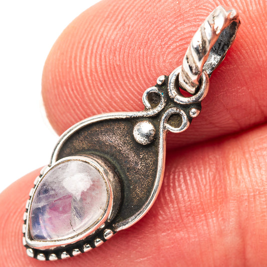 Oval rainbow moonstone cabochon pendant, ornate .925 sterling silver setting