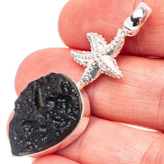 Sterling silver seastar pendant with dark tektite teardrop stone and loop bail