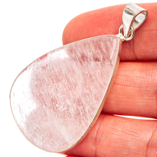 Selenite teardrop pendant with silver-plated bail and pink crystal sheen