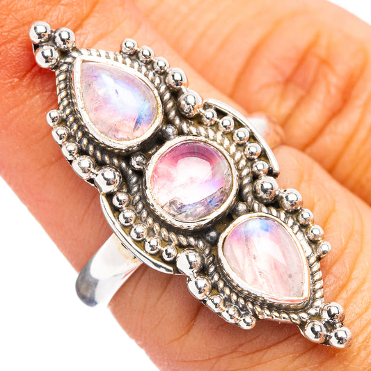 Sterling silver ring with three pink teardrop stones and beadwork setting