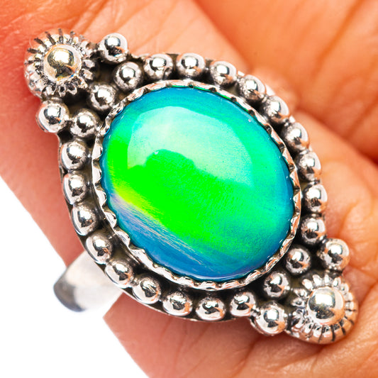 925 sterling silver ring with oval opal cabochon, green-blue shimmer bezel setting