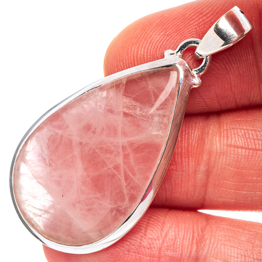 Rose quartz teardrop pendant showing pink stone texture, .925 sterling silver bail