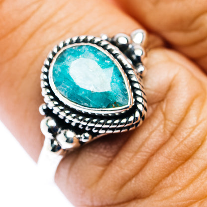 Sterling silver teardrop emerald ring with turquoise-green stone and braided bezel