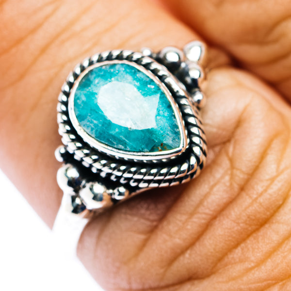 Sterling silver teardrop emerald ring with turquoise-green stone and braided bezel