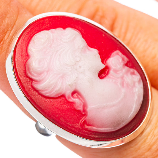 Sterling silver cameo ring with oval red setting and white carved profile face