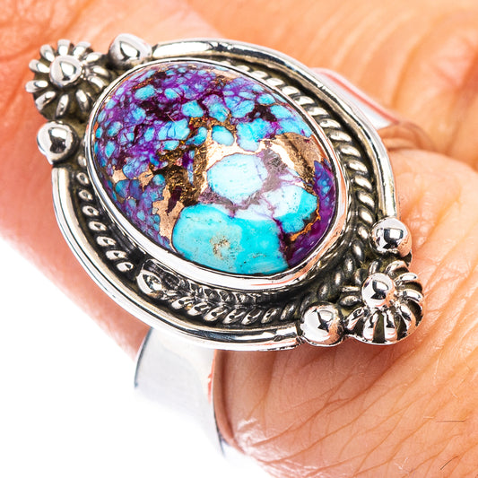 Sterling silver oval turquoise ring with purple-blue stone and ornate bezel