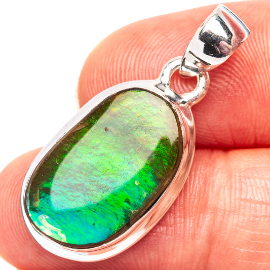 Sterling silver ammolite pendant with oval green-blue stone and hinged bail