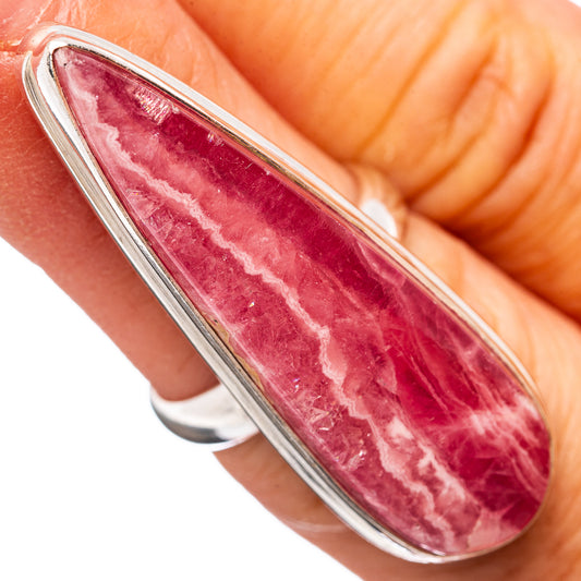 Sterling silver ring with oval pink rhodochrosite cabochon, close-up view
