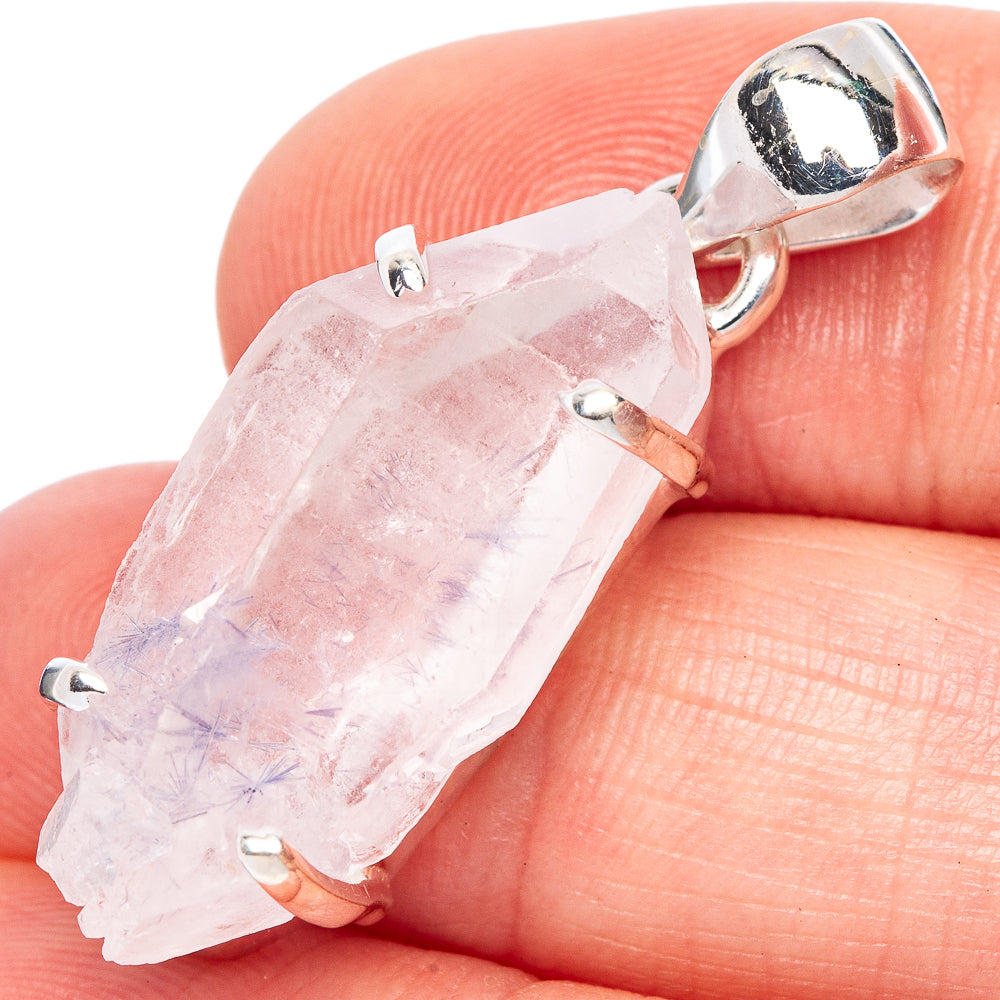 Sterling silver pendant with rose-pink to pale lavender crystal drop, prong-set bail