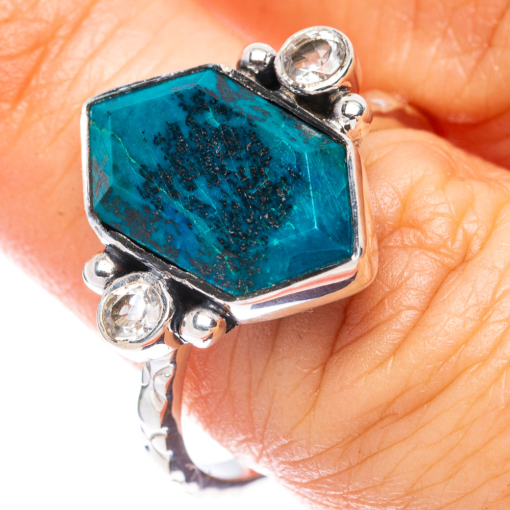 Sterling silver ring with blue shattuckite octagon center stone and four clear accents