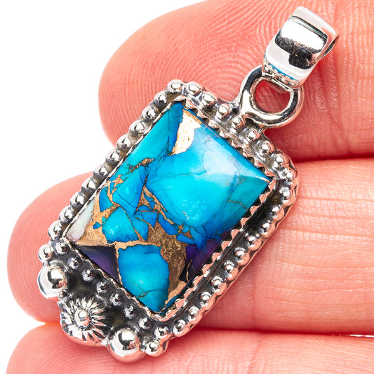 Sterling silver turquoise pendant with blue rectangular stone and ornate beaded frame