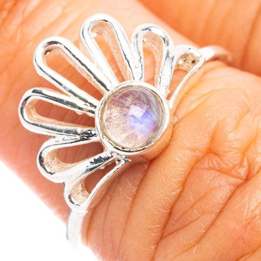 Sterling silver daisy ring with rainbow moonstone center and raised petal setting