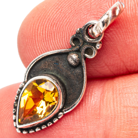 Citrine sterling silver pendant with oval yellow gemstone and ornate openwork bail