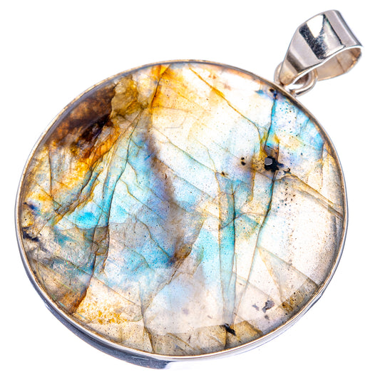 Round labradorite cabochon pendant with blue and gold tones in sterling silver bezel