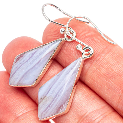 Sterling silver earrings with teardrop blue lace agate stones and openwork frames