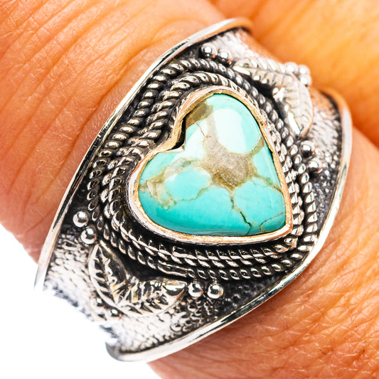 925 sterling silver turquoise heart ring with ornate rope bezel, close-up on stone