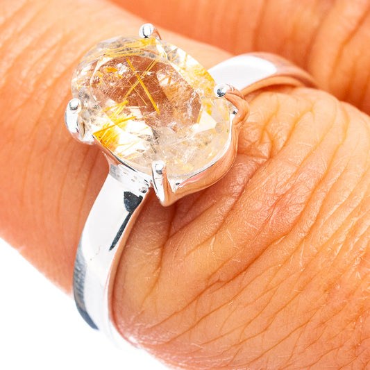 Sterling silver rutilated quartz ring with clear stone and golden needle inclusions