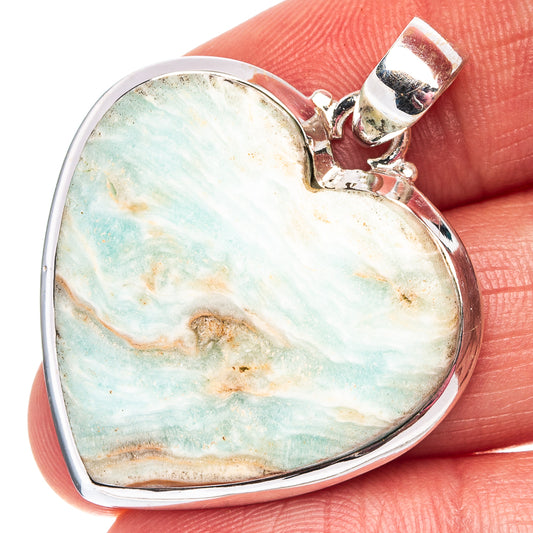 Sterling silver heart pendant with blue-green aragonite stone in heart setting