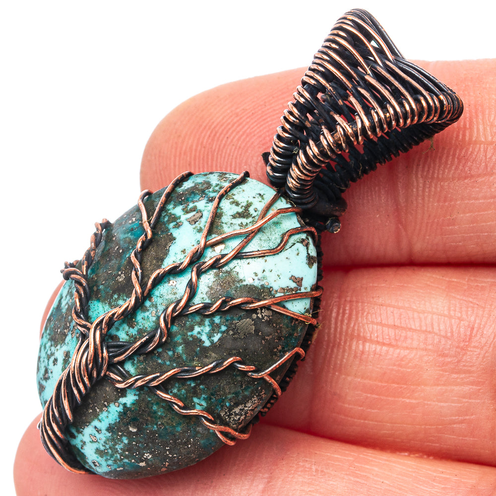 Turquoise teardrop tree-of-life wire-wrapped pendant with oxidized copper detailing
