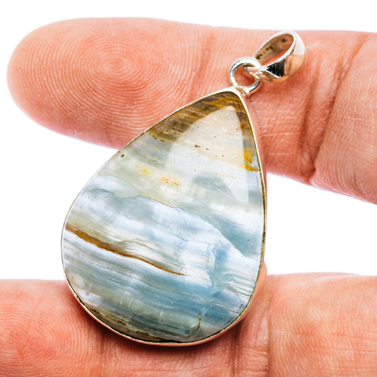 Teardrop calcite pendant with silver bezel and loop, blue-gray banded stone