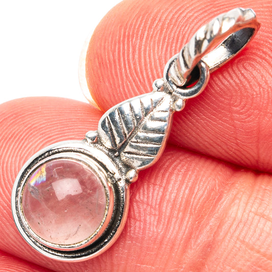 Sterling silver rose quartz pendant with round pink gemstone and bail loop