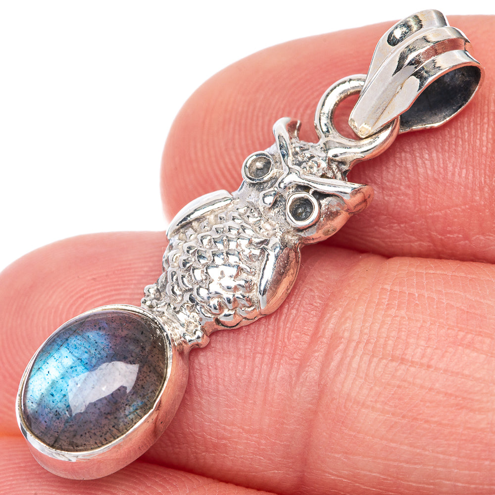 925 sterling silver pendant with oval labradorite and sculpted animal charm, hinged bail