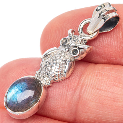 925 sterling silver pendant with oval labradorite and sculpted animal charm, hinged bail