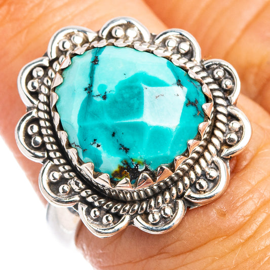 Turquoise oval cabochon sterling silver ring with scalloped border and petal-like details