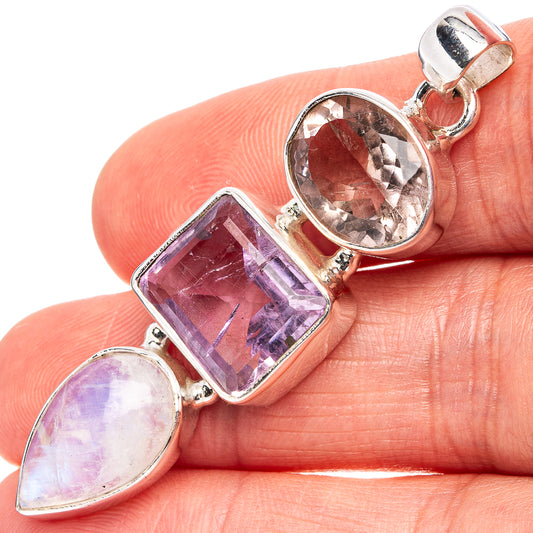 Sterling silver pendant with oval pink, square purple, and oval light-lavender stones