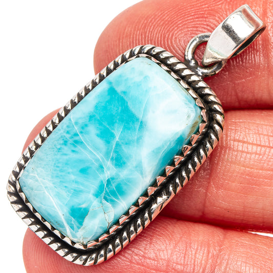 Larimar stone pendant with .925 sterling silver rope border and rectangular blue cabochon