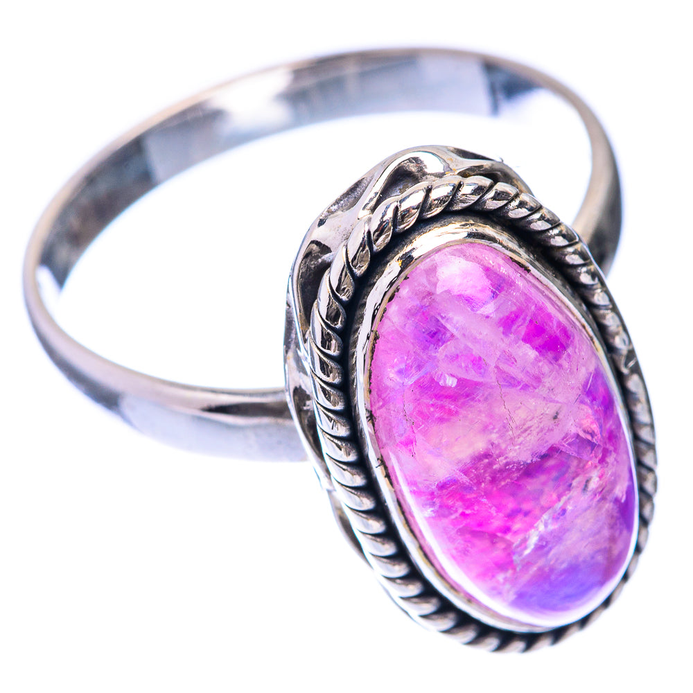 Silver ring with oval pink-purple cabochon stone and braided rope-style bezel