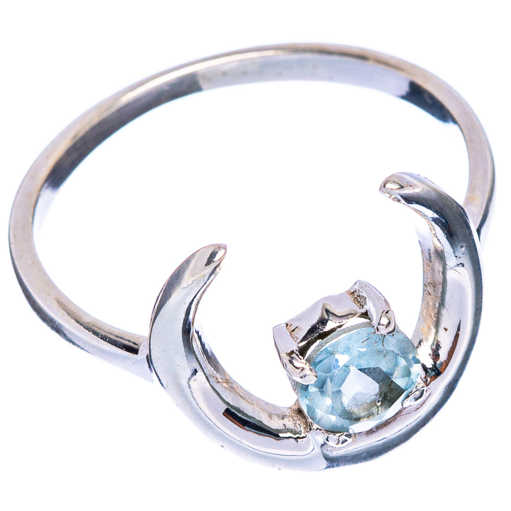 Silver moon ring with oval light-blue gemstone at center, curved crescent bezel