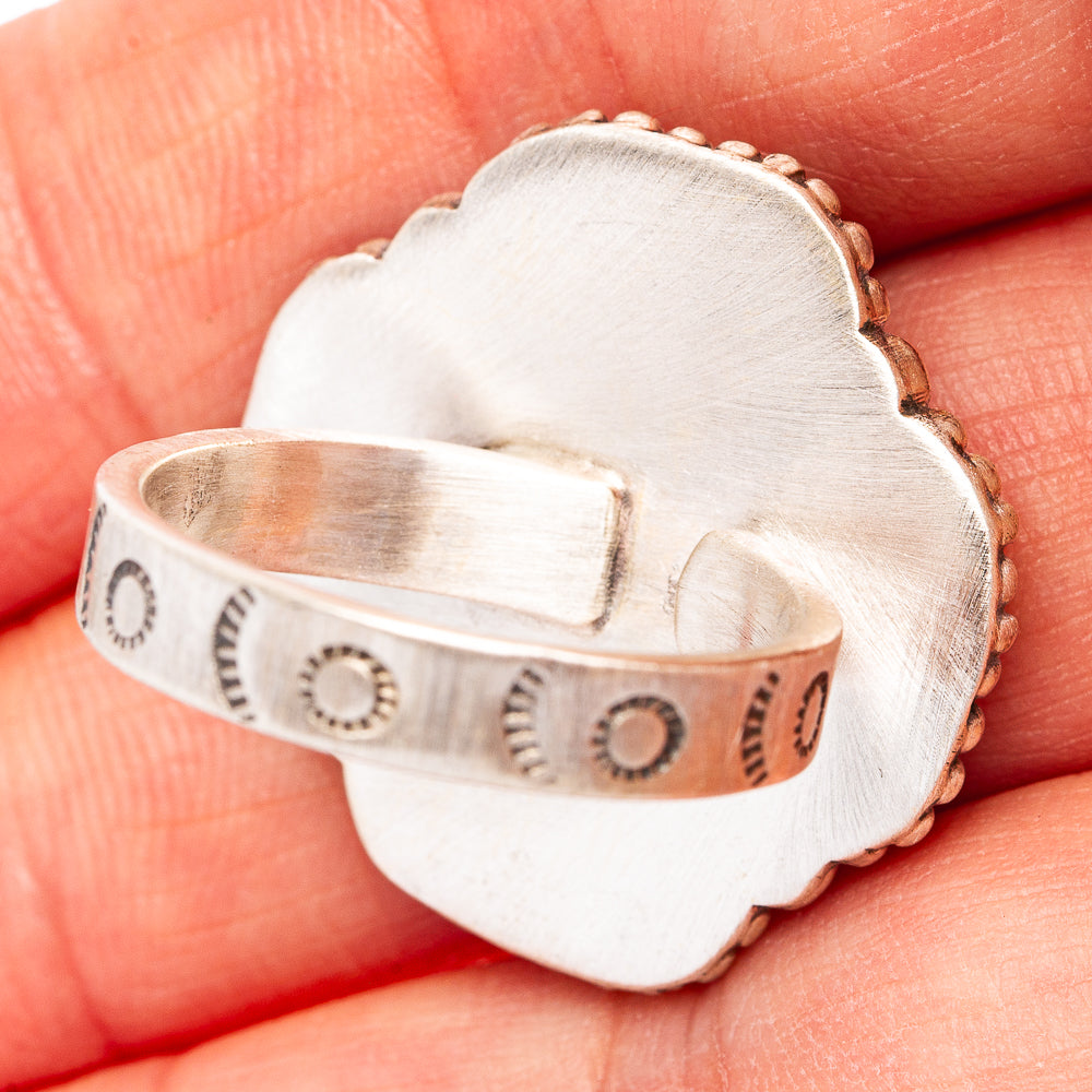 Silver cross ring back with engraved dot pattern on the band
