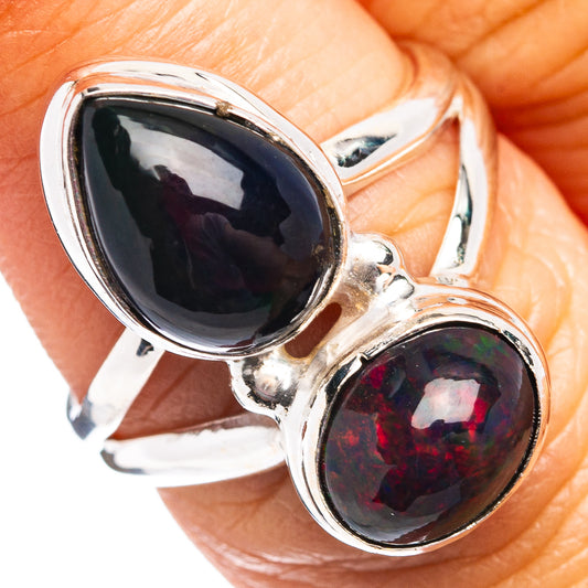 Sterling silver ring with oval dark opal gemstones, prong setting, size 7