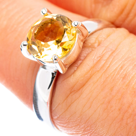 Faceted citrine ring in .925 sterling silver with round yellow gemstone and prongs