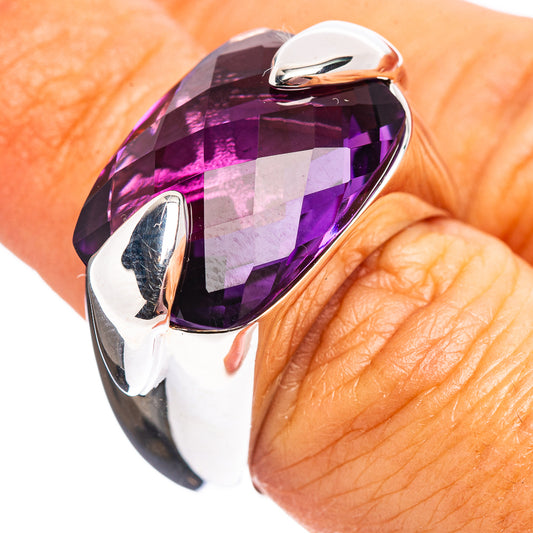 Sterling silver ring with faceted purple amethyst, polished band
