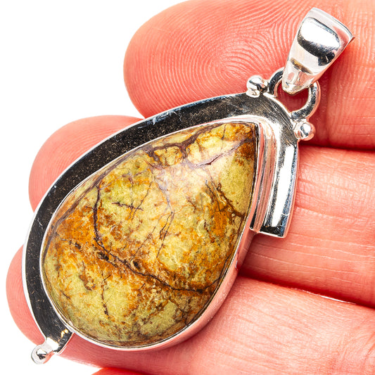 925 sterling silver gaspeite teardrop pendant, framed stone in polished bezel