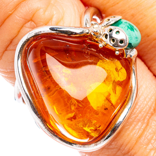 Heart-shaped amber ring with ladybug charm, .925 sterling silver setting