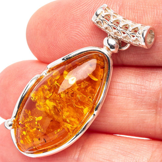 Baltic amber pendant with oval amber stone in .925 sterling silver bezel