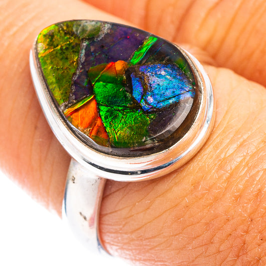 Sterling silver ammolite ring with oval iridescent green, blue and purple stone