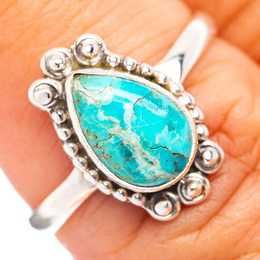 Sterling silver turquoise ring with teardrop Mojave stone and bead-edge design