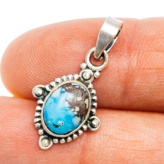 Turquoise cabochon sterling silver pendant with beaded border