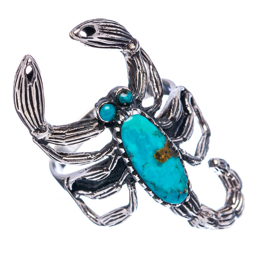 Sterling silver scorpion ring with large turquoise oval and small round blue stones