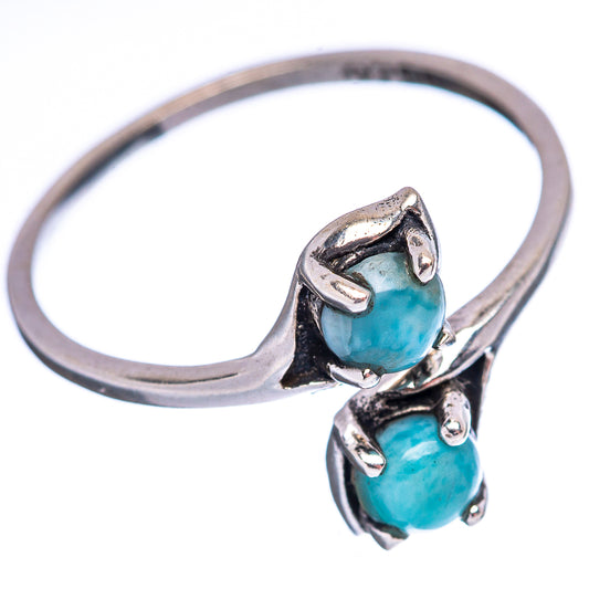 Sterling silver ring with two stacked blue larimar cabochons in openwork bezels
