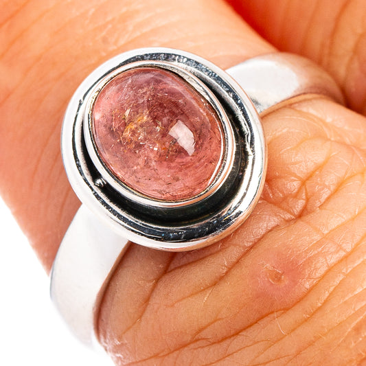 Sterling silver pink tourmaline ring with oval gemstone, close-up on band