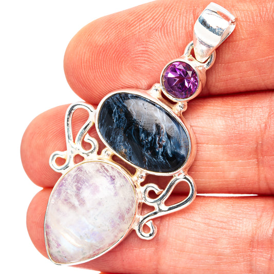Sterling silver pendant with oval amethyst and rainbow moonstone gemstones