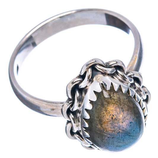 Sterling silver ring with labradorite dome cabochon and ornate claw setting, blue